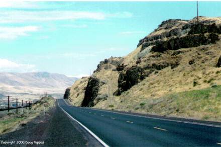 Oregon Trail ruts descending to US 30 roadbed, north-central Oregon