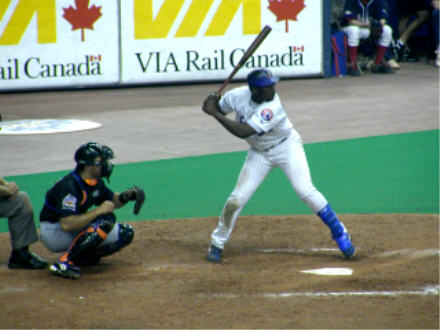 Vlad Guerrero starting his swing, Mike Piazza catching