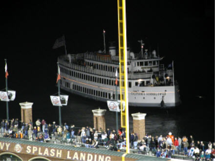 Tourist boat close behind RF stands