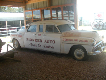 Two-hooded car formerly used to promote the Museum
