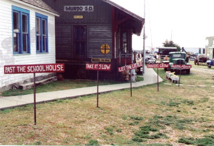 Old rail depot with Burma-Shave signs